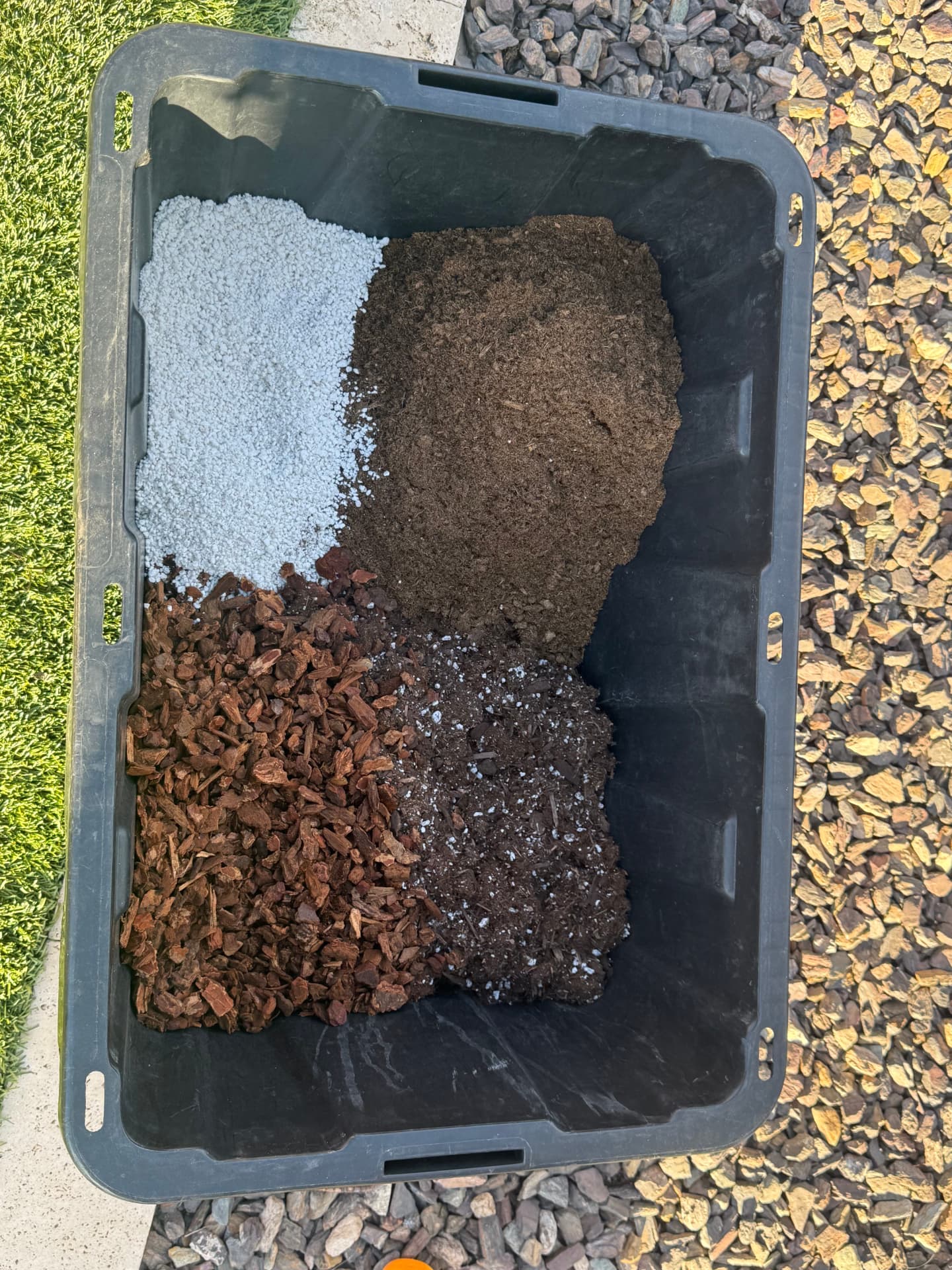Perlite, bark and chunky potting mix separated in a tray